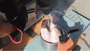 Watch This Guy Cook A Turkey With Molten Aluminum And Then Eat It